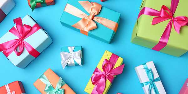 An image of gift boxes on a blue background. 